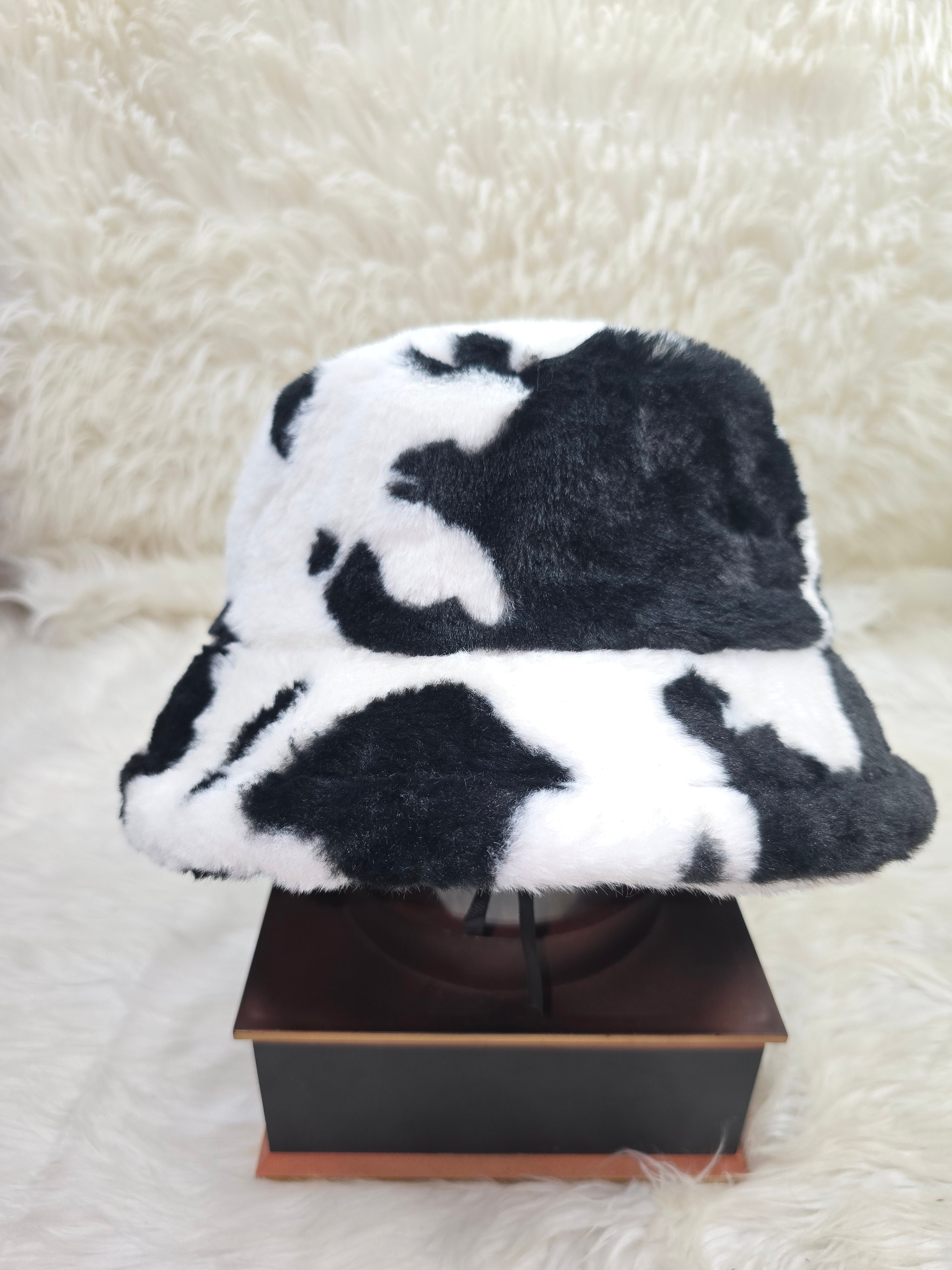The "OG" Cowprint Fuzzy Bucket Hat